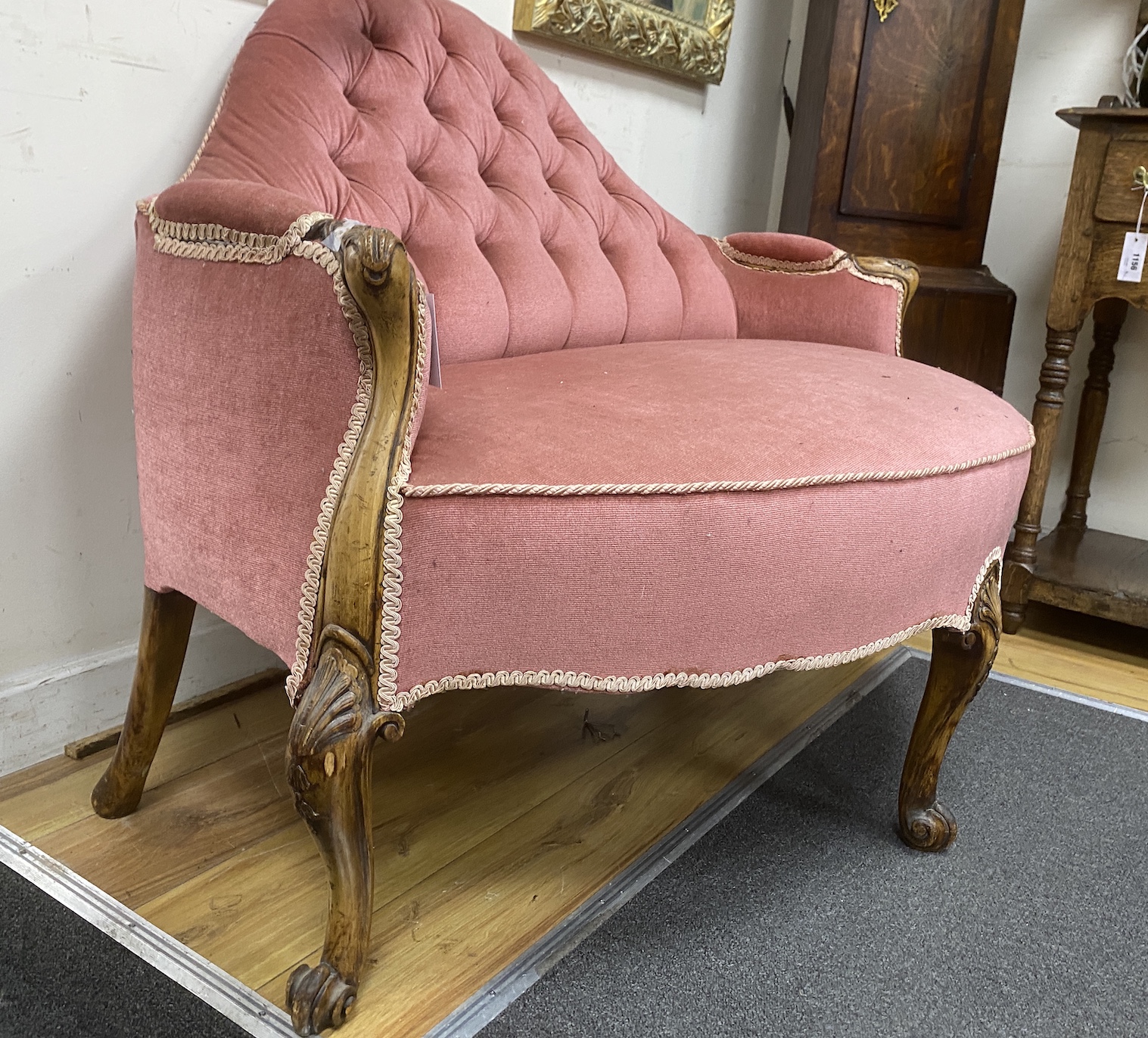 A Victorian carved walnut settee, length 116cm, depth 80cm, height 88cm
